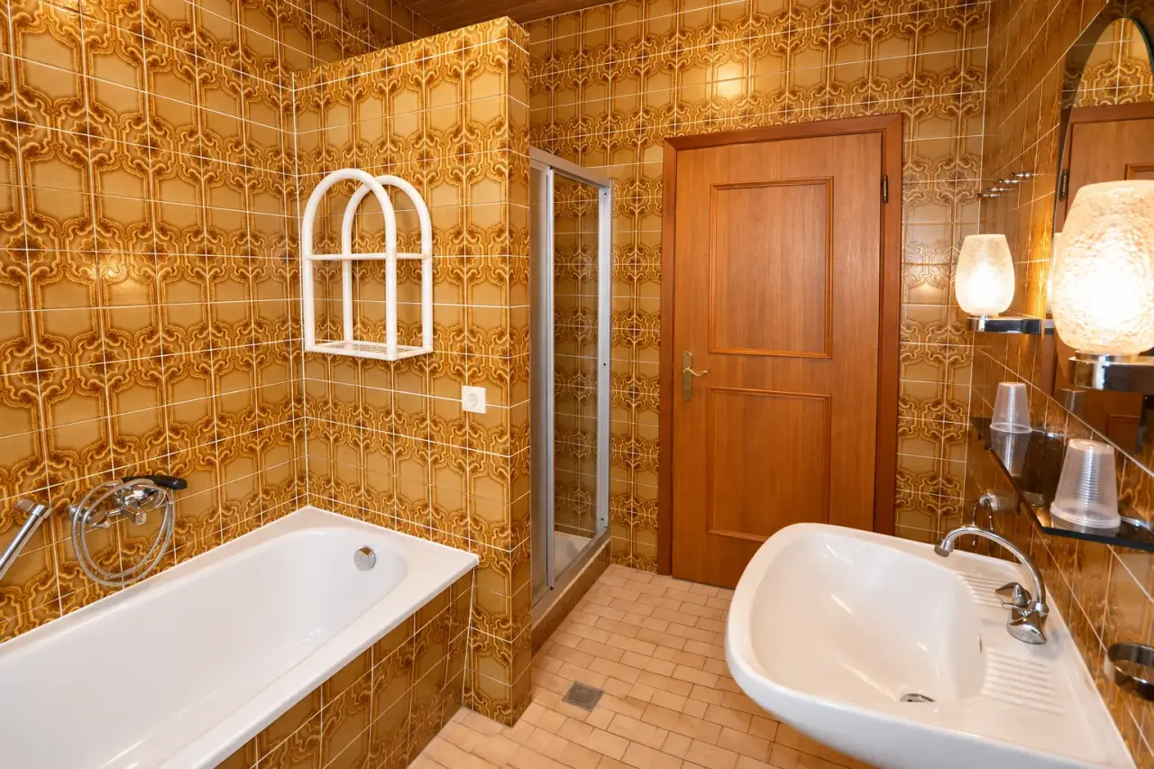 Haus Alpina   Ensuite kamer badkamer 1